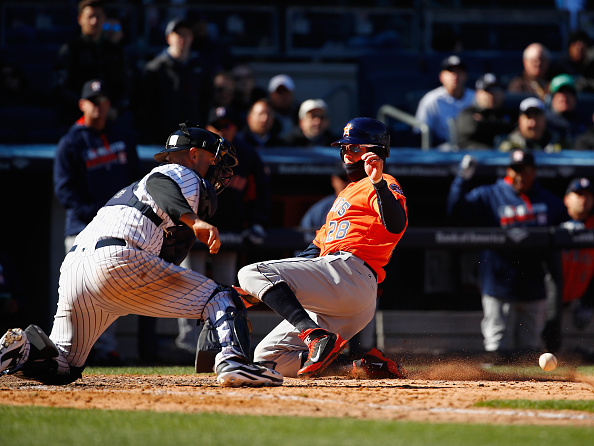 Correa's dribbler boosts Astros over Yanks 5-3 in opener